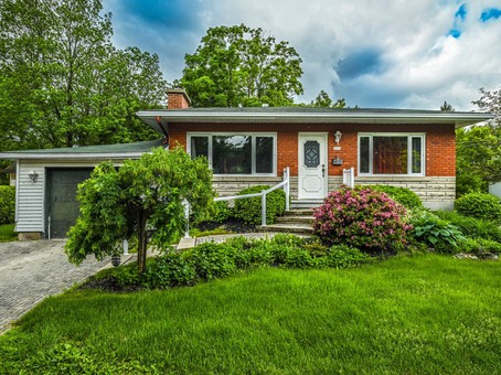 Maison tout de brique dans un quartier familial